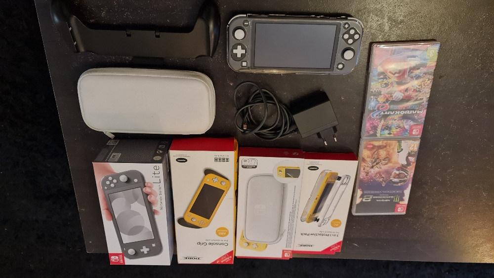 [Sale] - Nintendo Switch Lite Grey with games and extras | Nintendo ...